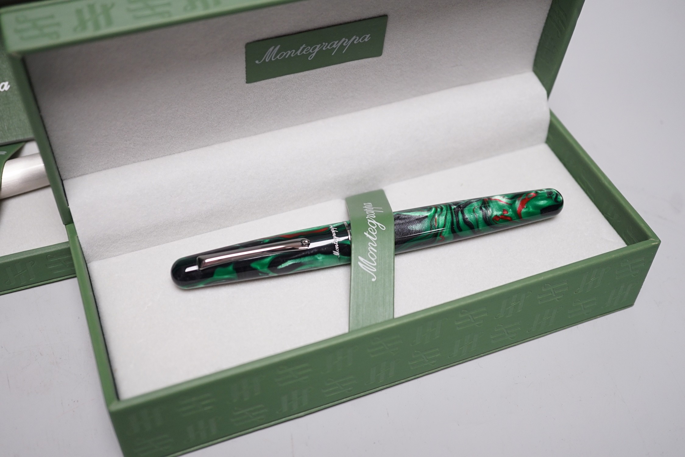 Two Montegrappa fountain pens; Elmo 01 Black Star Calla Lily and Silver mule, cased